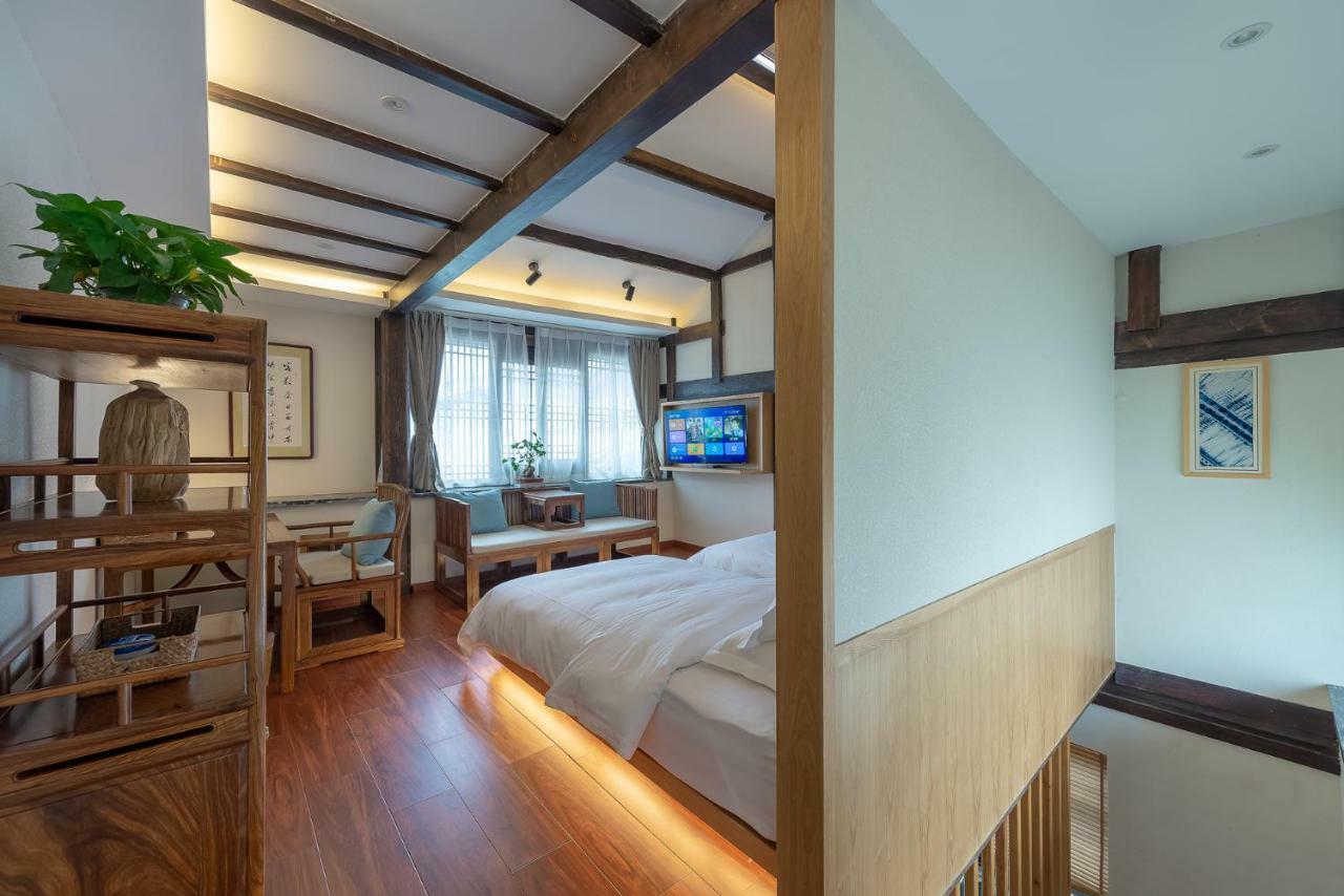 Lijiang Qilu Garden Hotel Baisha  ภายนอก รูปภาพ